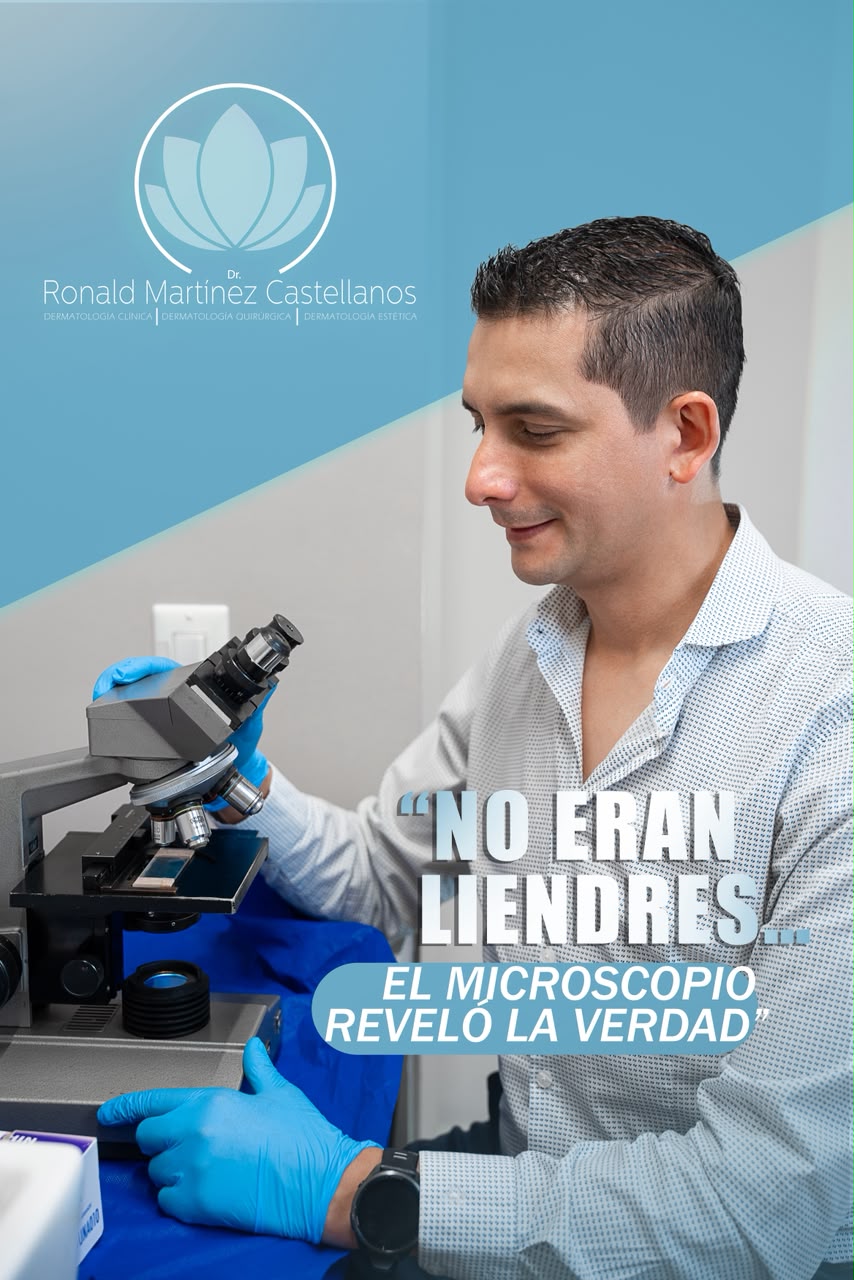 Dr. Ronald Martínez revisando una muestra en microscopio